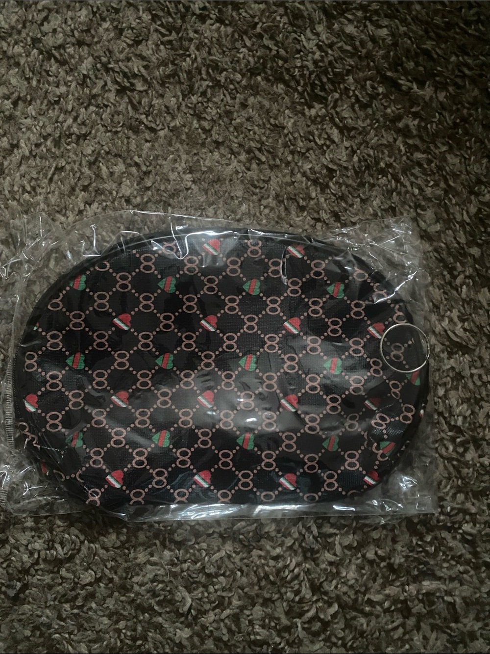 Black Patterned Cosmetic Pouch with Green and Red Accents
